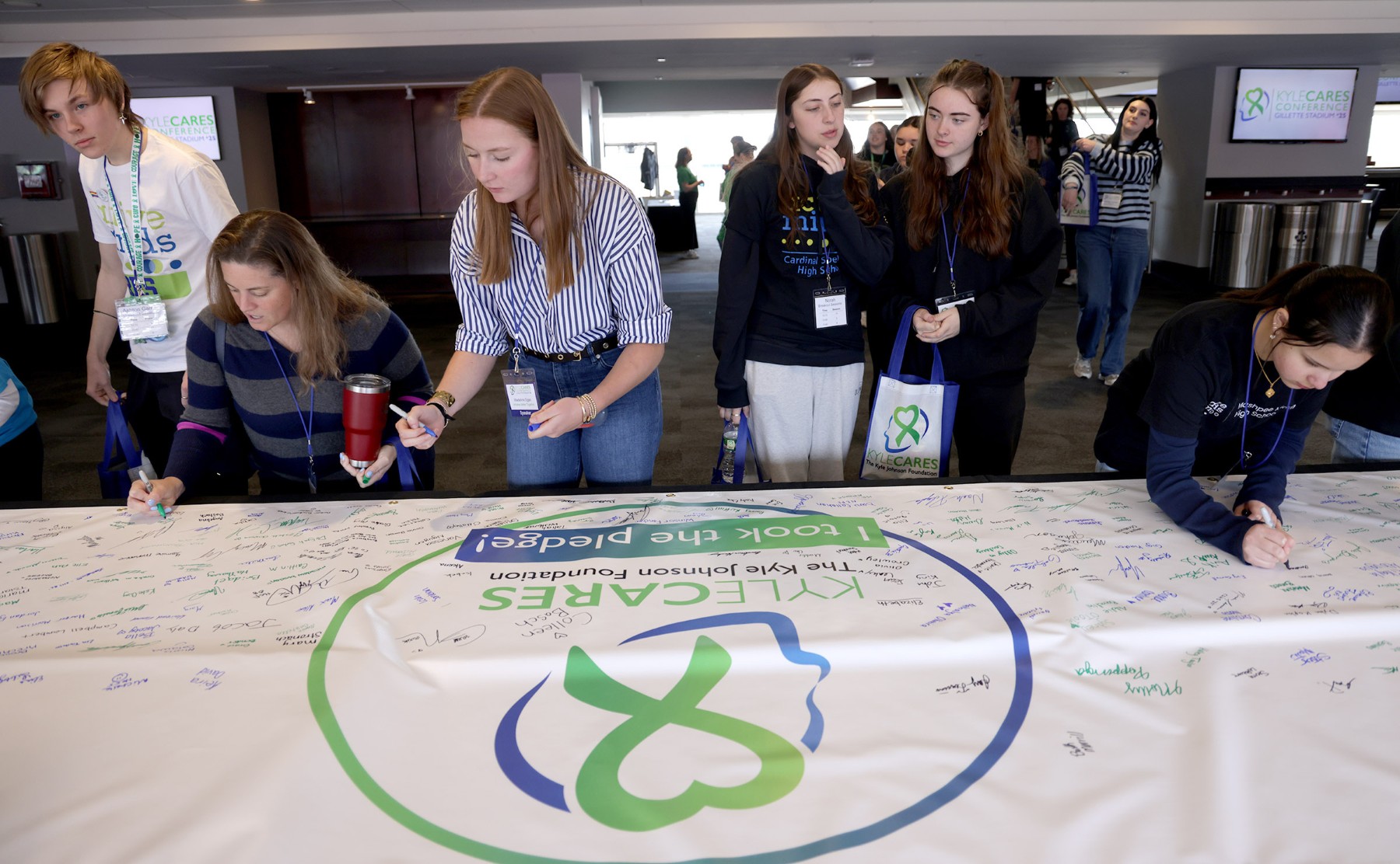 KyleCares Conference 2025 – banner signing